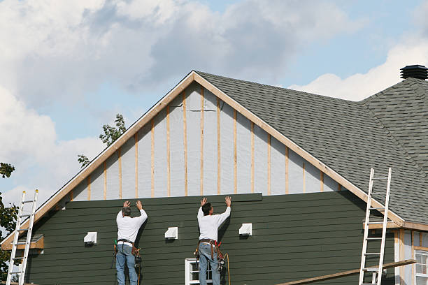 Professional Siding Installation technician working in Loveville, MD